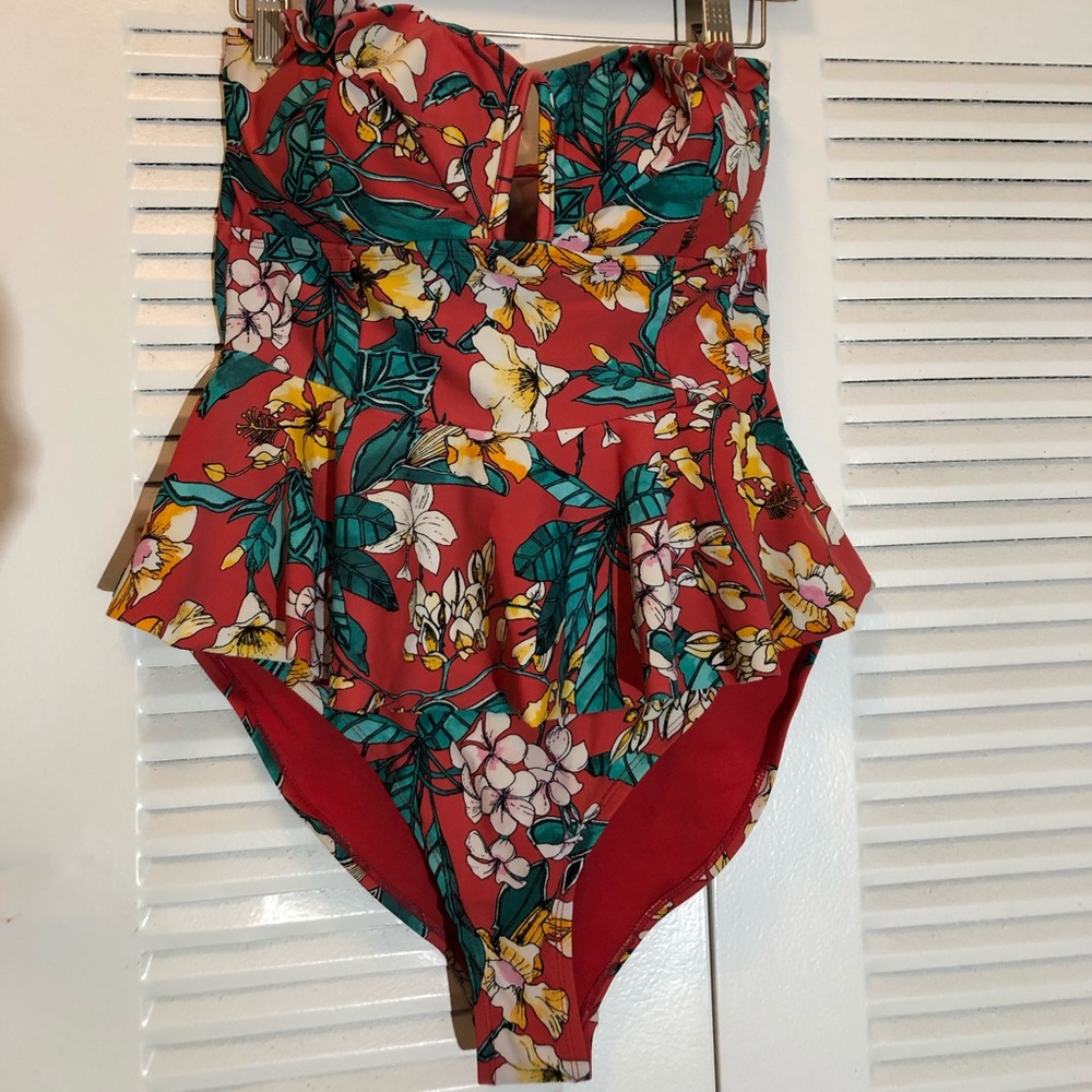 GENTLY USED ONE PIECE SWIMSUIT WITH PEPLUM TOP